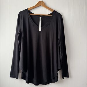 Lululemon Sz 6 Up For Down Time Relaxed Long Sleeve Silk Blend Top in Black